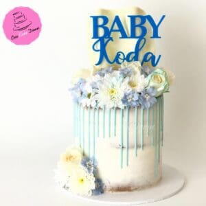 Blue baby shower drip cake
