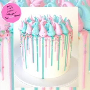 Pink and blue baby shower drip cake